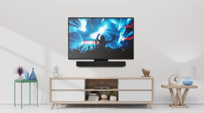 TV mit Sonos Beam über Medienmöbel platziert